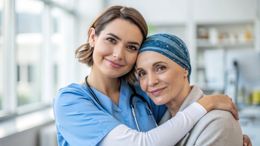 A female nurse or a doctor hugging a woman, oncology patient.