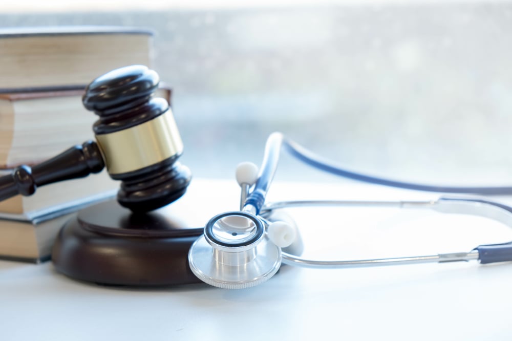 Gavel and stethoscope. medical jurisprudence. legal definition of medical malpractice